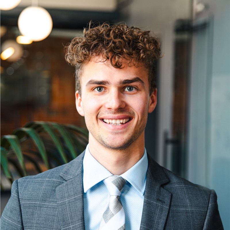 Professional headshot of Samson Schmidt